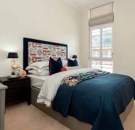 Bedroom with cream walls and luxury decor