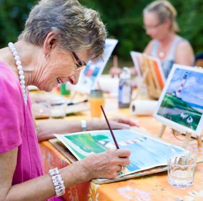 Owner hobbies and painting group in retirement village
