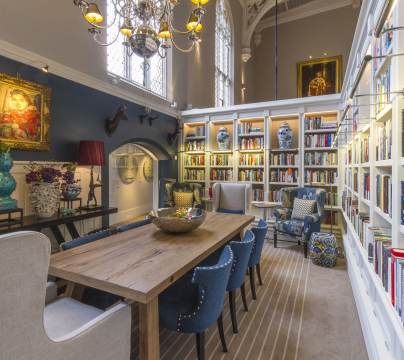 Bookshelves and grand Victorian furnishings