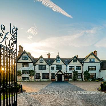 Front view on a Tudor style manor house