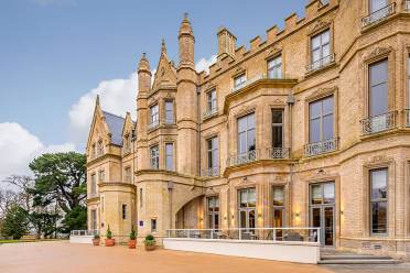 Pale stone building in Victorian-Gothic style