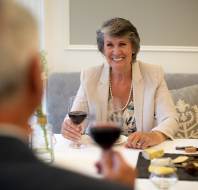 Man and woman enjoying wine with dinner