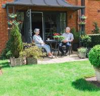Owners in their retirement village garden