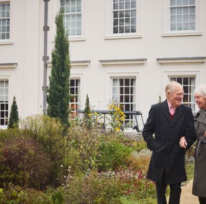 Owners taking a stroll around the beautiful grounds at our Ascot retirement village