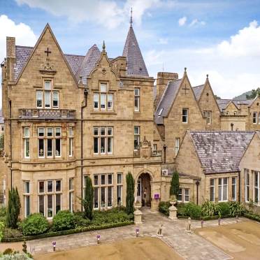 Aerial front view of a Victorian Gothic building