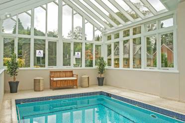 Swimming pool at Audley Willicombe Park, Tunbridge Wells Swimming pool in glazed building
