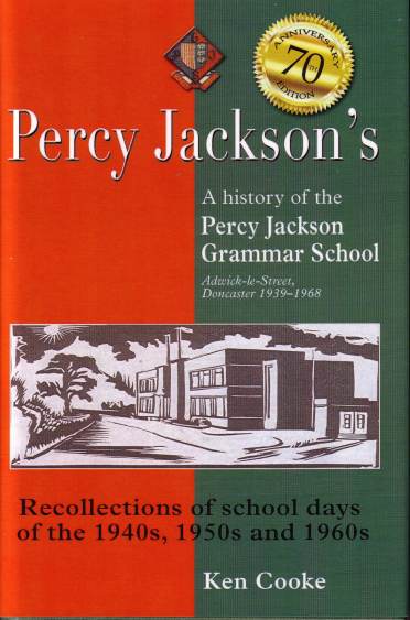 Cover of "Percy Jackson's: A history of the Percy Jackson Grammar School" by Ken Cooke. It features a 70th anniversary badge and an illustration of a school building.