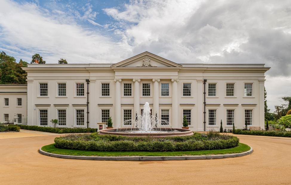 Mansion house with broad drive and fountain